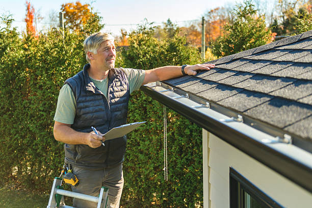 Professional Roof Leak Repair technician working in Fowler, MI